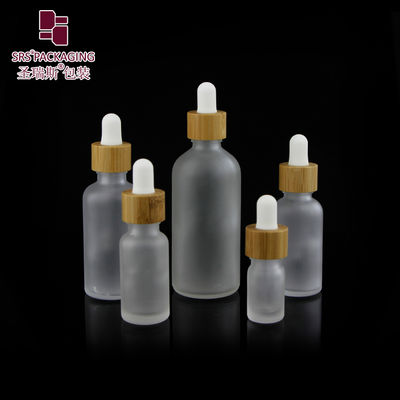 ซื้อ Custom Frosted Essential Oil Empty Packaging 15ml 30ml 50ml 100ml Bamboo Dropper Bottle การผลิตออนไลน์