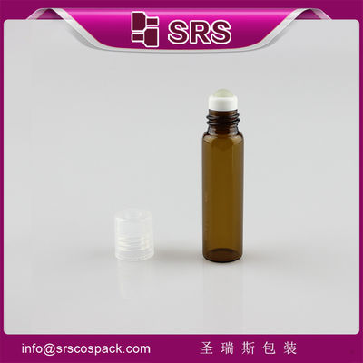 กระปุกแก้วเปล่าและม้วน 5 ml บนกระปุกน้ําหอม 5 ml
